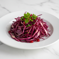 Red cabbage shredded on white background